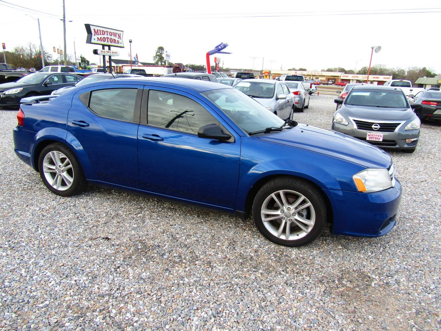 2012 Blue Dodge Avenger SE (1C3CDZAG6CN) with an 3.6L V6 DOHC 24V FFV engine, Automatic transmission, located at 15016 S Hwy 231, Midland City, AL, 36350, (334) 983-3001, 31.306210, -85.495277 - Photo#0